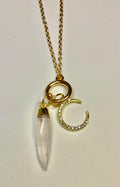 Gold Tone Clear Quartz Point Necklace