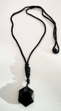 Carved Obsidian pendant
