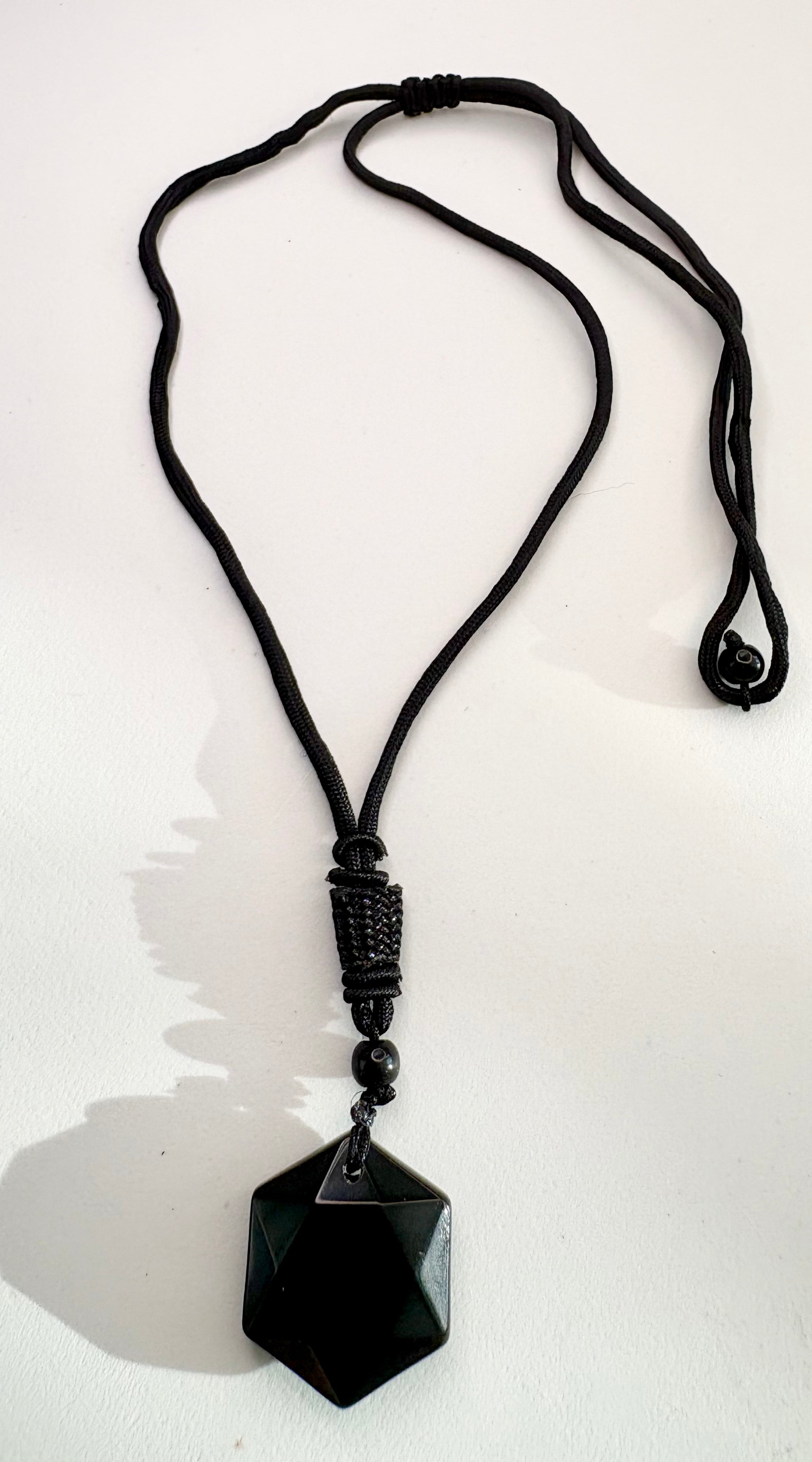 Carved Obsidian pendant