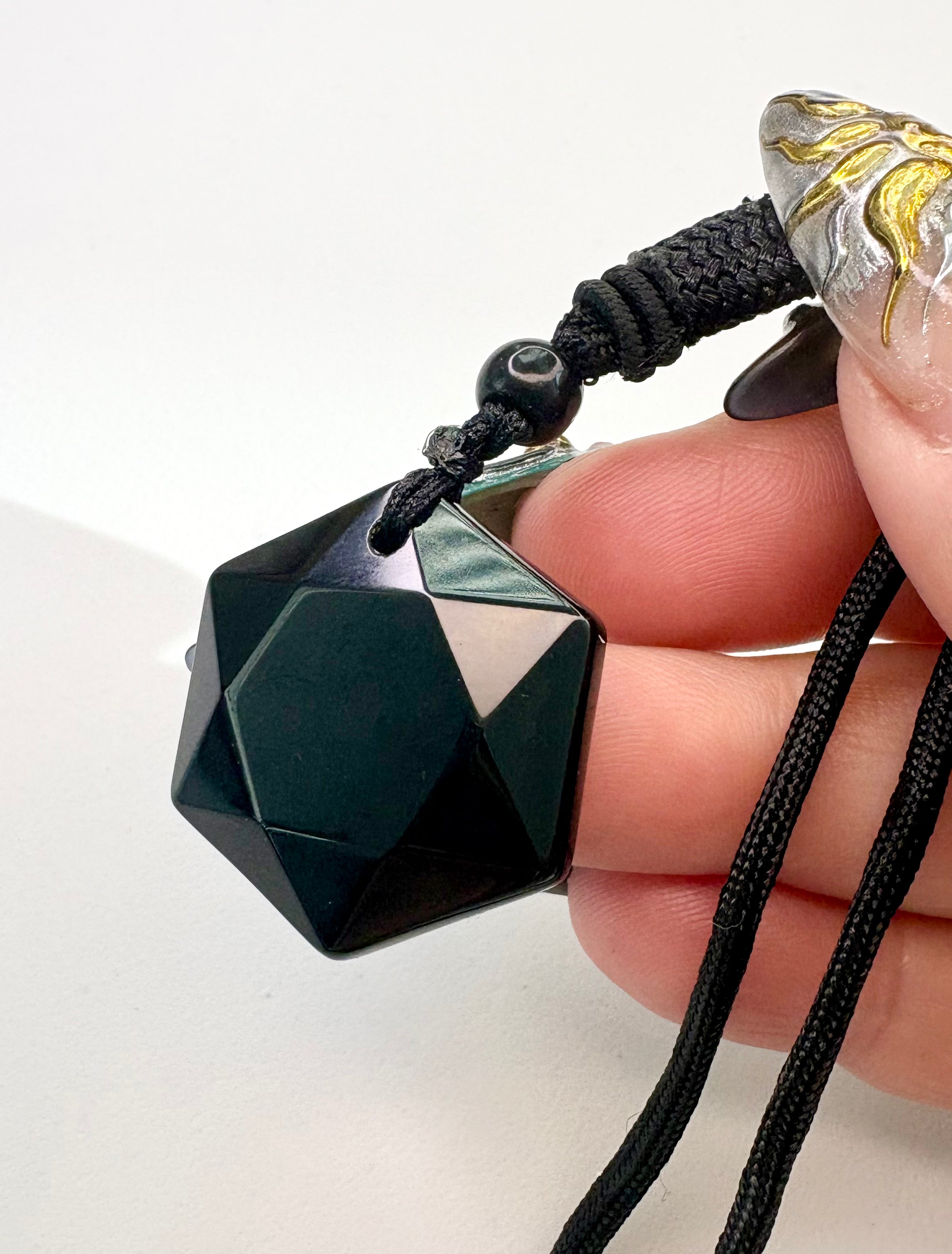 Carved Obsidian pendant